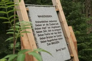 Stone tablet with hiking blessing in the forest